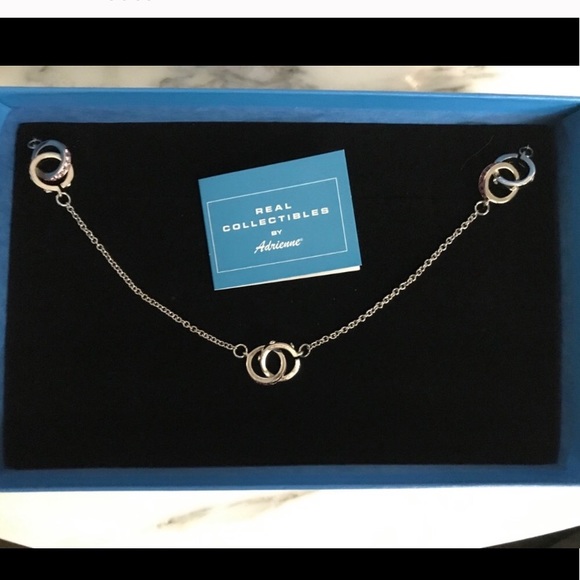 Real Collectibles by Adrienne interlocking rings - Picture 1 of 4